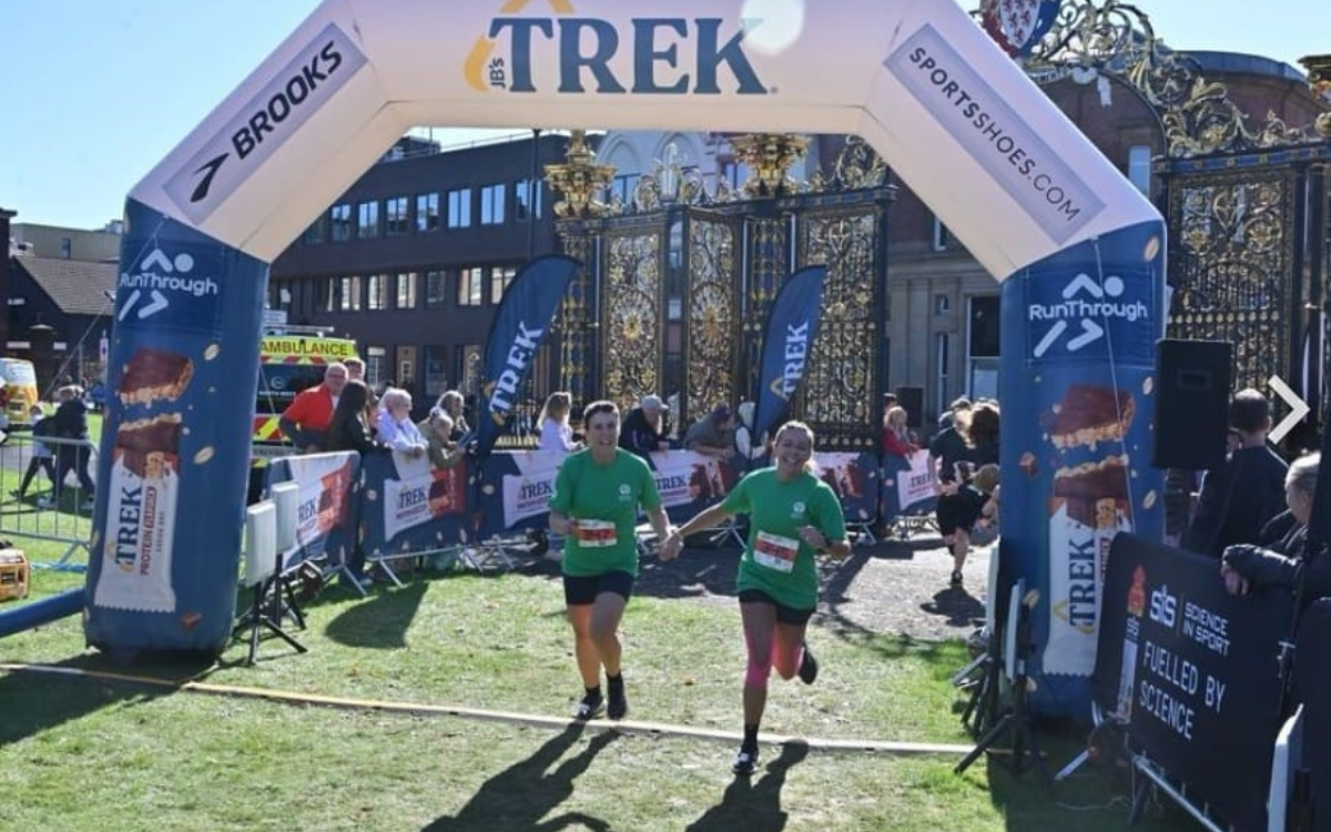 2.	Sarah Nuttie (consultant midwife, WHH) with friend Diane Dawber celebrating as they cross the finish line in aid of the Willow Tree Hub Appeal.