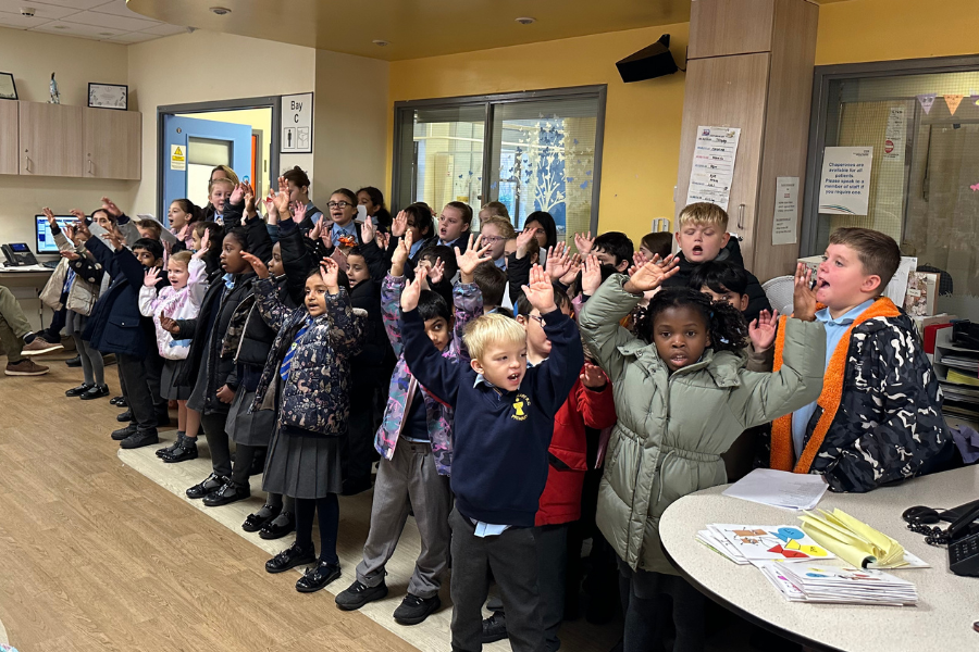Local school performs for patients