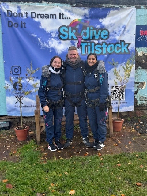 Community partners fundraising through a skydive