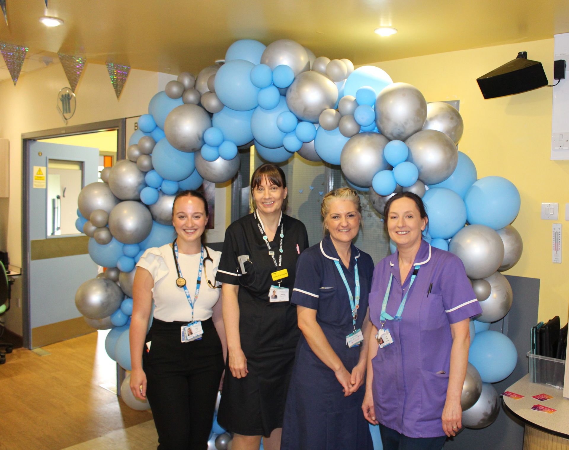 Forget me not unit staff celebrating 10 year anniversary.