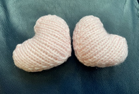 Pink knitted hearts.