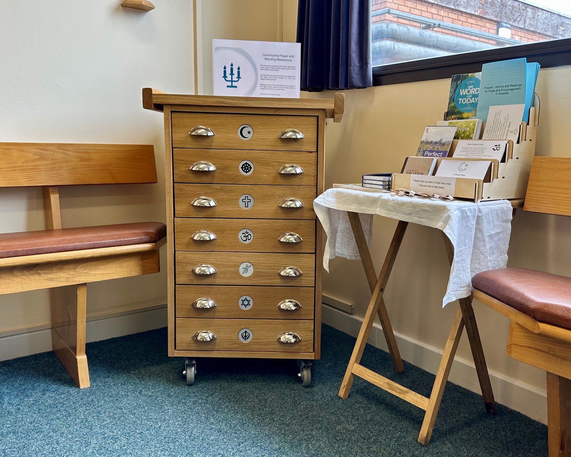 Seven drawer multi-faith cabinet made of oak.