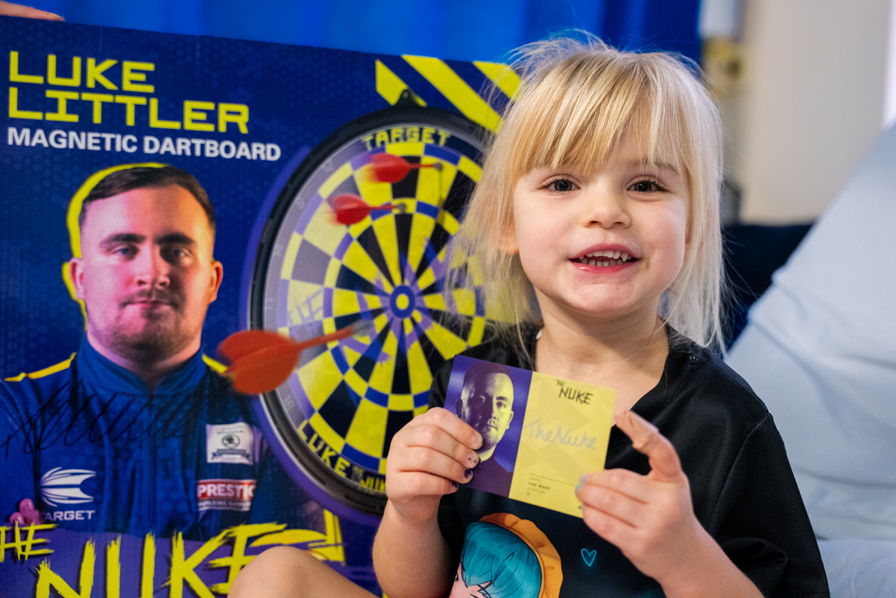 Mollie-Mae, age 4 with gifts from Luke 