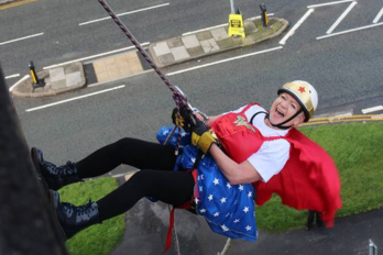Staff member abseiling 