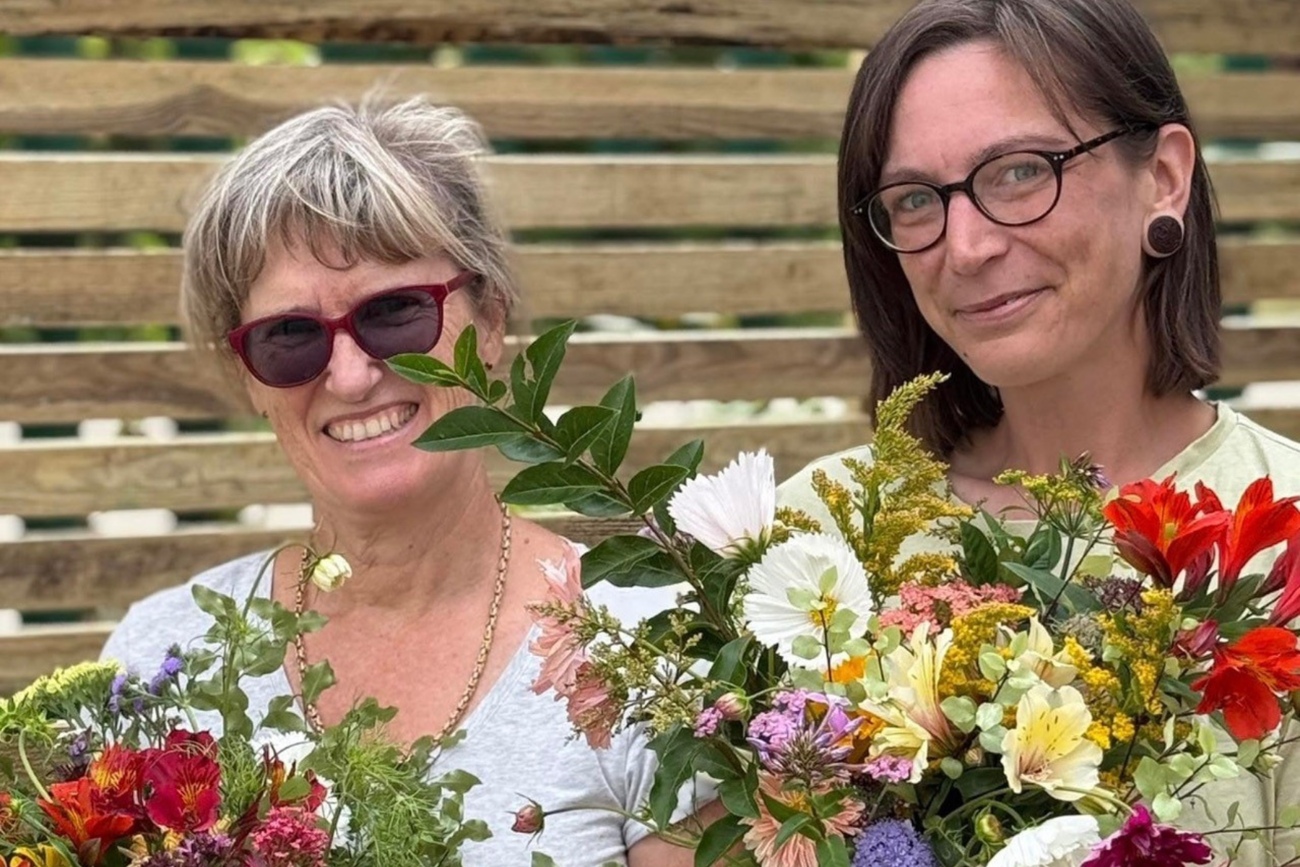 Volunteers with flowers